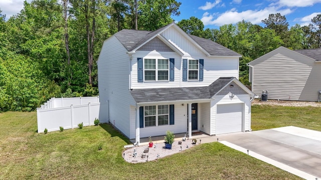 109 Winding Path Dr, Loris, SC 29569 - traditional-style house with roof with shingles, covered porch, and driveway