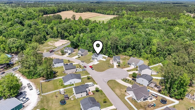 109 Winding Path Dr, Loris, SC 29569 - aerial view of property's location featuring a heavily wooded area and nearby suburban area