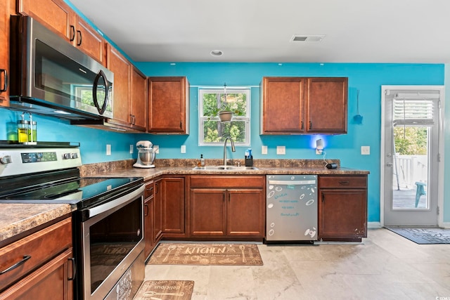 109 Winding Path Dr, Loris, SC 29569 - kitchen with appliances with stainless steel finishes, a sink, and healthy amount of natural light