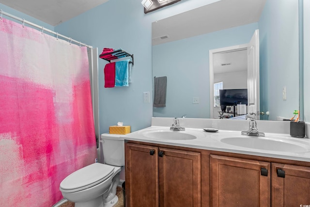 109 Winding Path Dr, Loris, SC 29569 - full bathroom featuring double vanity, toilet, and a shower with shower curtain