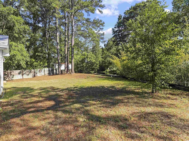 view of yard featuring fence