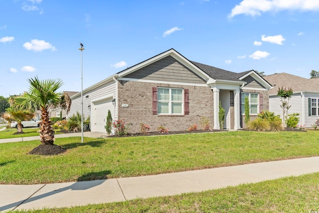 ranch-style home featuring concrete driveway, brick siding, an attached garage, and a front yard