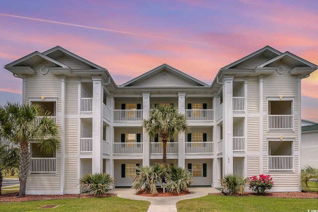 view of property at dusk