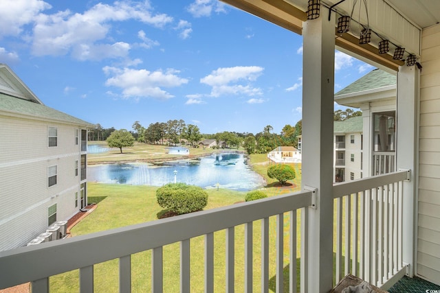 balcony featuring a water view