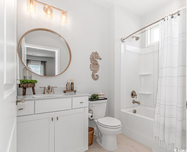 bathroom featuring vanity, plenty of natural light, shower / bath combo with shower curtain, and toilet