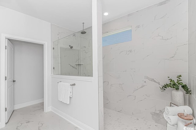 full bathroom with a walk in shower, recessed lighting, marble finish floor, and baseboards