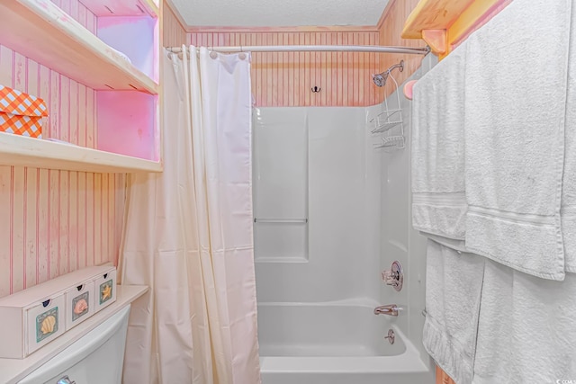 1100 Possum Trot Rd Unit H136, North Myrtle Beach, SC 29582 - bathroom featuring shower / tub combo and a textured ceiling