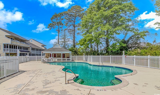 1100 Possum Trot Rd Unit H136, North Myrtle Beach, SC 29582 - community pool with a patio area