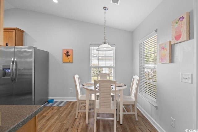 680 Twinflower St, Little River, SC 29566 - dining area with wood finished floors, visible vents, baseboards, vaulted ceiling, and recessed lighting