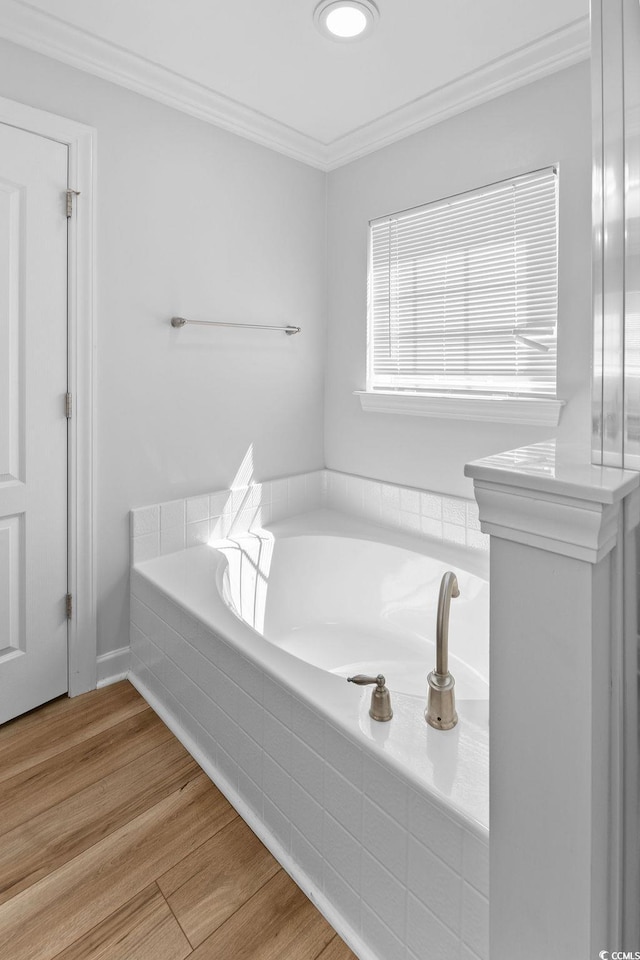 680 Twinflower St, Little River, SC 29566 - full bath with ornamental molding, a bath, and wood finished floors