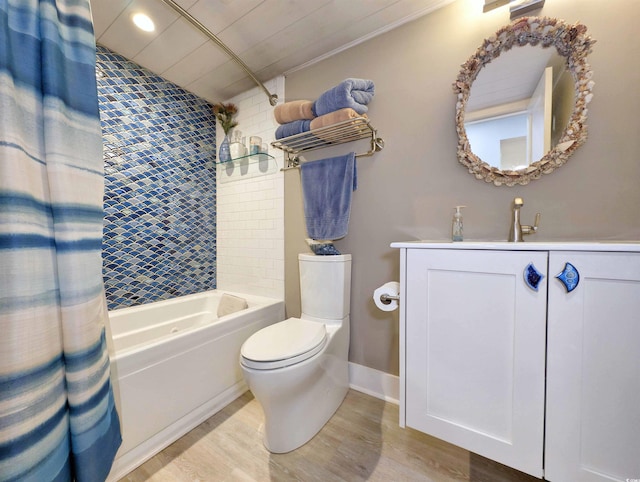 full bath with vanity, toilet, shower / bath combo with shower curtain, recessed lighting, and wood finished floors