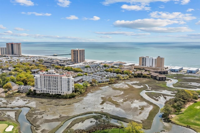 bird's eye view featuring a view of city, a water view, and view of golf course