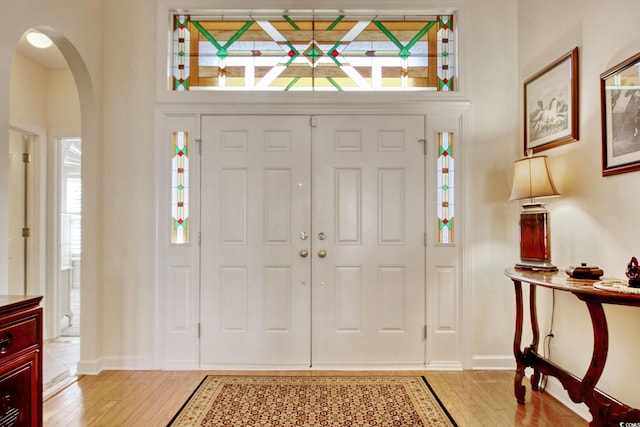78 Saltwind Loop, Murrells Inlet, SC 29576 - entryway featuring arched walkways, baseboards, and light wood-type flooring