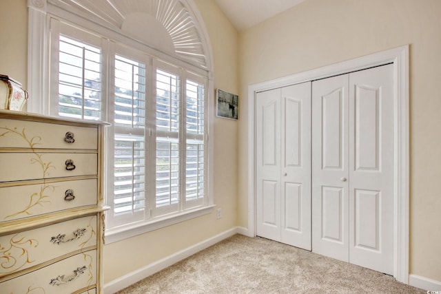 78 Saltwind Loop, Murrells Inlet, SC 29576 - unfurnished bedroom with baseboards, light colored carpet, and a closet