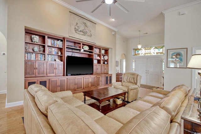 78 Saltwind Loop, Murrells Inlet, SC 29576 - living room with ceiling fan, light wood finished floors, arched walkways, baseboards, and ornamental molding