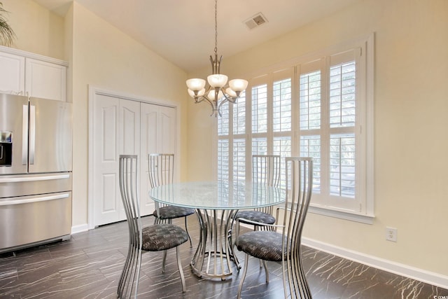 78 Saltwind Loop, Murrells Inlet, SC 29576 - dining room with baseboards, a wealth of natural light, a chandelier, and visible vents