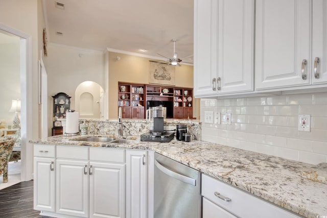 78 Saltwind Loop, Murrells Inlet, SC 29576 - kitchen with ornamental molding, white cabinetry, backsplash, and dishwasher