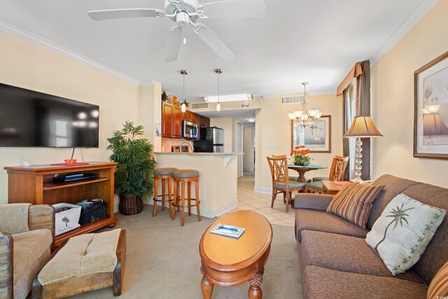 215 77th Ave N Unit 807, Myrtle Beach, SC 29572 - living room with visible vents, baseboards, ceiling fan with notable chandelier, ornamental molding, and light tile patterned flooring