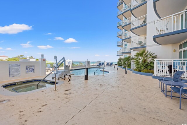 215 77th Ave N Unit 807, Myrtle Beach, SC 29572 - view of pool with a hot tub