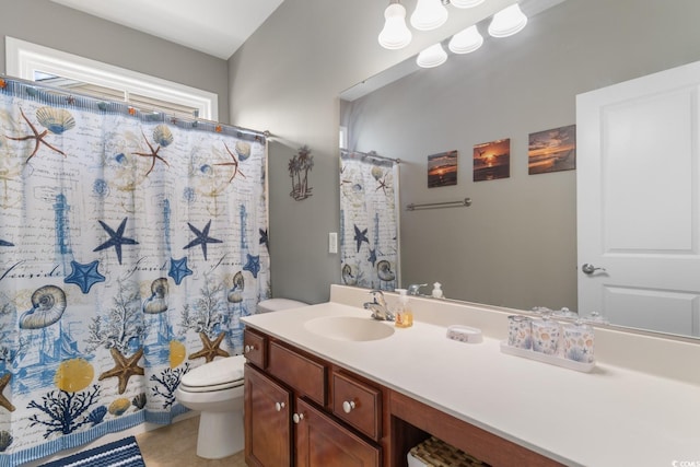 full bathroom with vanity, tile patterned flooring, toilet, and curtained shower