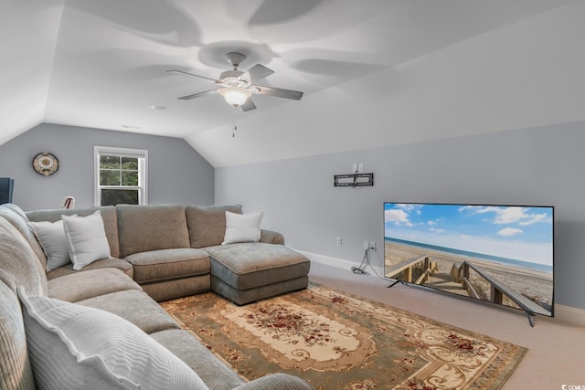 carpeted living room with baseboards, ceiling fan, and lofted ceiling