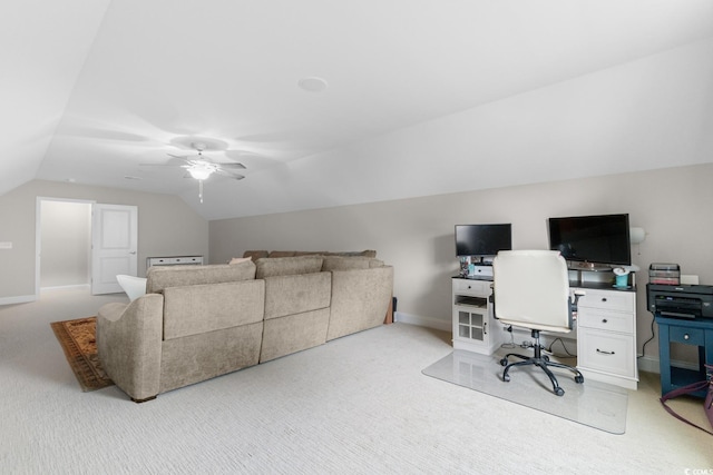 office with baseboards, carpet, ceiling fan, and lofted ceiling