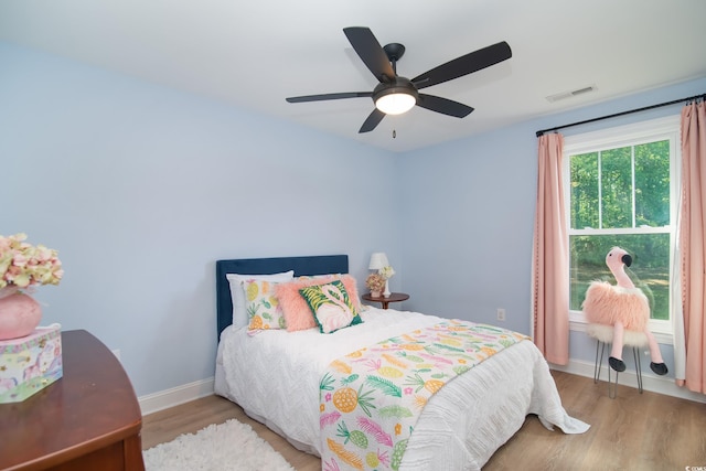 294 Field Loop Rd, Georgetown, SC 29440 - bedroom with wood finished floors, baseboards, and a ceiling fan