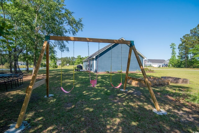 294 Field Loop Rd, Georgetown, SC 29440 - view of jungle gym with a trampoline and a lawn