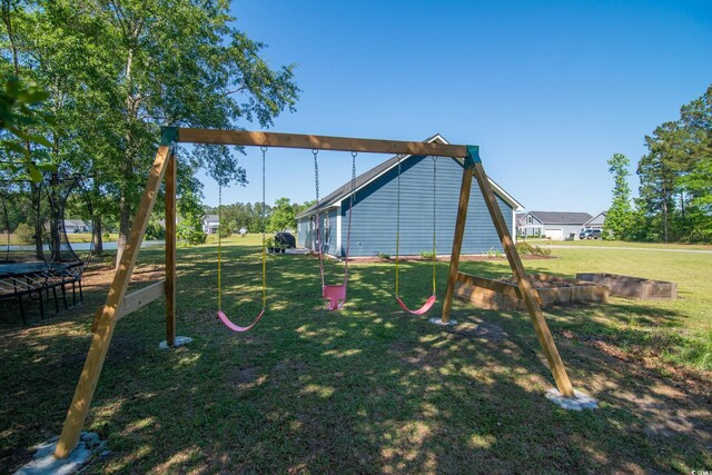 294 Field Loop Rd, Georgetown, SC 29440 - view of jungle gym featuring a trampoline and a lawn