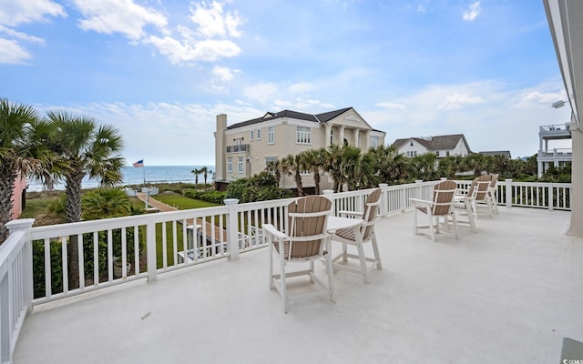 view of patio featuring a water view