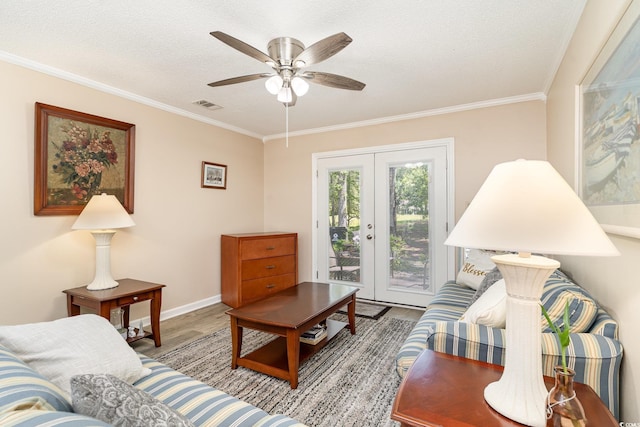 6734 Blue Heron Blvd Unit 104, Myrtle Beach, SC 29588 - living room featuring ceiling fan, crown molding, visible vents, and wood finished floors