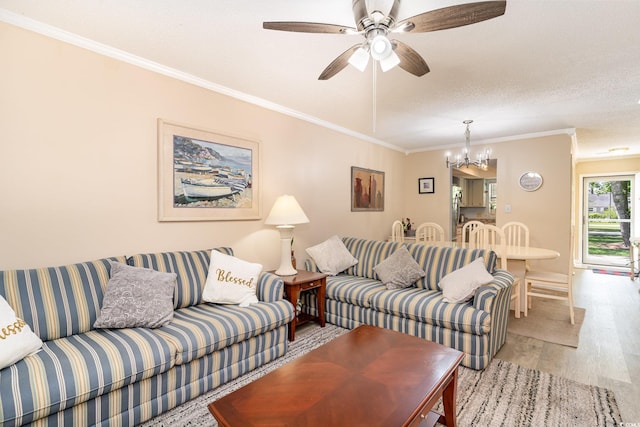 6734 Blue Heron Blvd Unit 104, Myrtle Beach, SC 29588 - living room with ornamental molding, light wood-style floors, baseboards, and ceiling fan with notable chandelier
