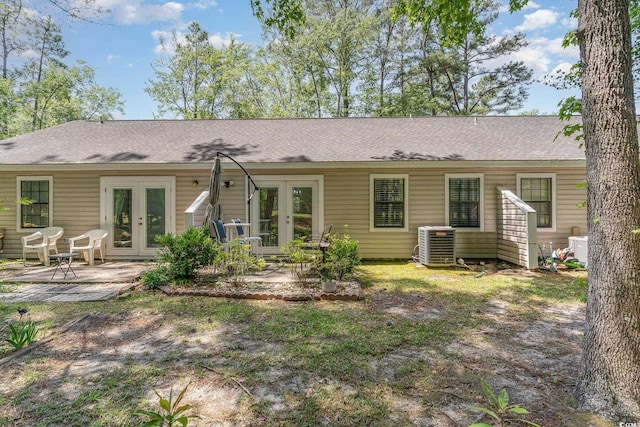 6734 Blue Heron Blvd Unit 104, Myrtle Beach, SC 29588 - back of property with central air condition unit, a patio, and french doors
