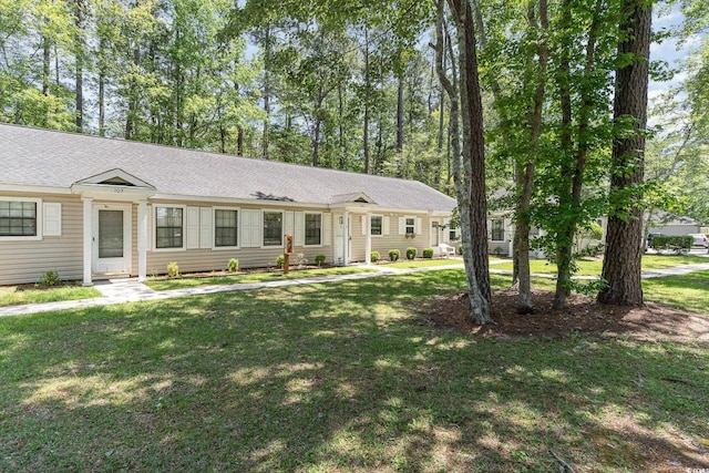 6734 Blue Heron Blvd Unit 104, Myrtle Beach, SC 29588 - ranch-style house with a front yard