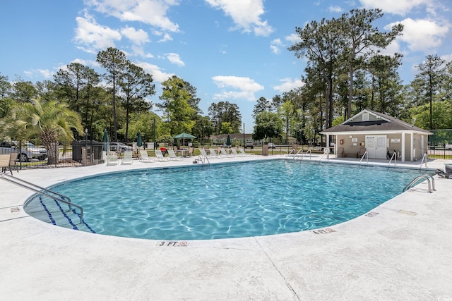 6734 Blue Heron Blvd Unit 104, Myrtle Beach, SC 29588 - community pool with a patio area and fence