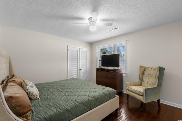617 Hibiscus Ave Unit 617, Myrtle Beach, SC 29577 - bedroom with visible vents, wood-type flooring, baseboards, a textured ceiling, and a ceiling fan