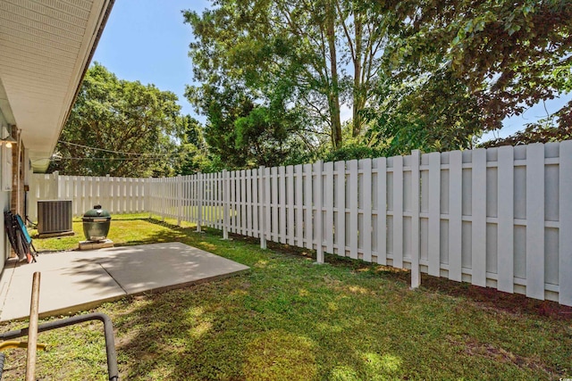 617 Hibiscus Ave Unit 617, Myrtle Beach, SC 29577 - view of yard with a fenced backyard, a patio, and central air condition unit