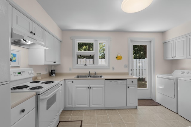 617 Hibiscus Ave Unit 617, Myrtle Beach, SC 29577 - kitchen featuring white cabinets, washer and dryer, a sink, white appliances, and under cabinet range hood
