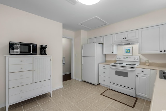 617 Hibiscus Ave Unit 617, Myrtle Beach, SC 29577 - kitchen with visible vents, white appliances, light countertops, under cabinet range hood, and white cabinets