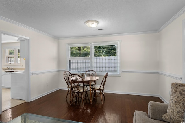 617 Hibiscus Ave Unit 617, Myrtle Beach, SC 29577 - dining room with baseboards, ornamental molding, and hardwood / wood-style floors