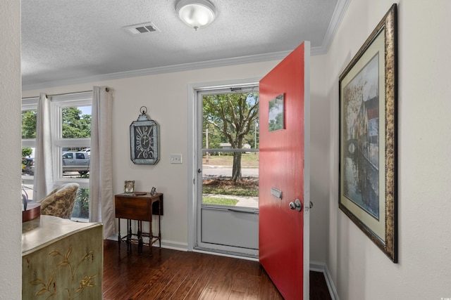 617 Hibiscus Ave Unit 617, Myrtle Beach, SC 29577 - entryway with crown molding, visible vents, a textured ceiling, and dark wood-type flooring