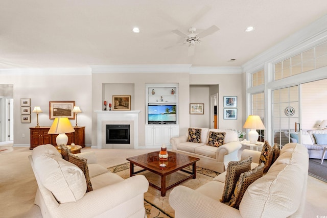 1617 Tradition Club Dr, Pawleys Island, SC 29585 - living area with ornamental molding, a ceiling fan, light carpet, and a fireplace