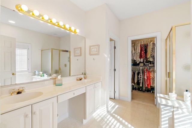 1617 Tradition Club Dr, Pawleys Island, SC 29585 - bathroom with a sink, tile patterned floors, a shower stall, and a spacious closet