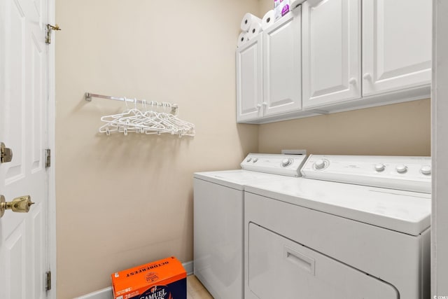 1617 Tradition Club Dr, Pawleys Island, SC 29585 - washroom featuring baseboards, cabinet space, and washer and clothes dryer