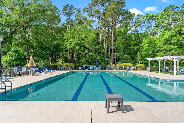1617 Tradition Club Dr, Pawleys Island, SC 29585 - community pool featuring fence, a pergola, and a patio