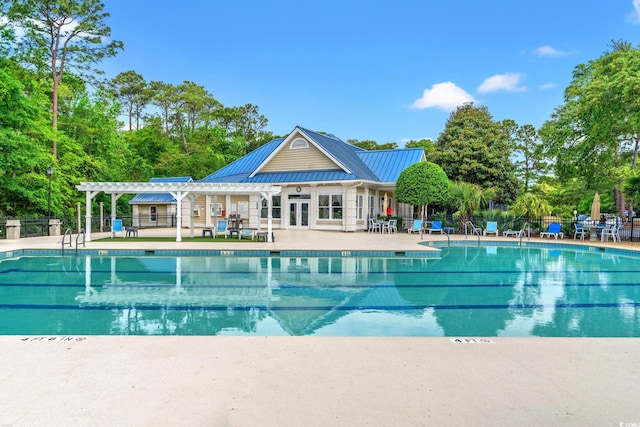 1617 Tradition Club Dr, Pawleys Island, SC 29585 - community pool with fence, a pergola, french doors, and a patio