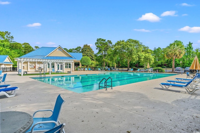 1617 Tradition Club Dr, Pawleys Island, SC 29585 - pool featuring a patio and fence