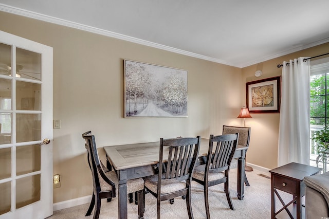 8209 Timber Ridge Rd, Conway, SC 29526 - dining area with baseboards, light colored carpet, and ornamental molding