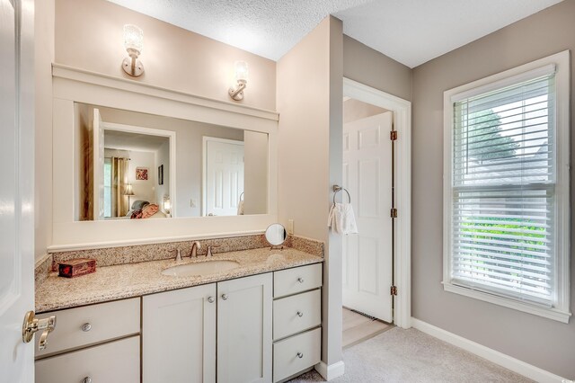 8209 Timber Ridge Rd, Conway, SC 29526 - bathroom with vanity, healthy amount of natural light, and baseboards