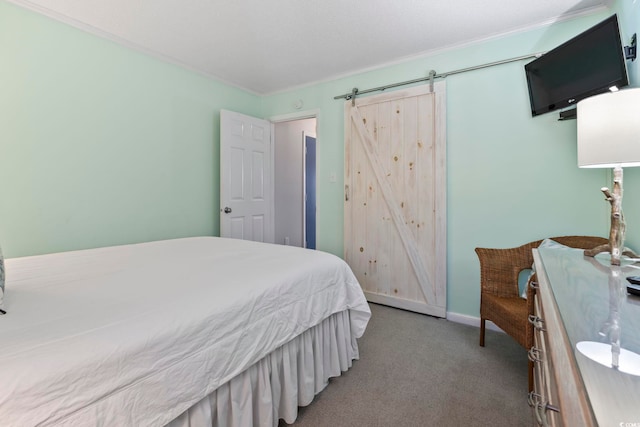 bedroom with crown molding and carpet floors